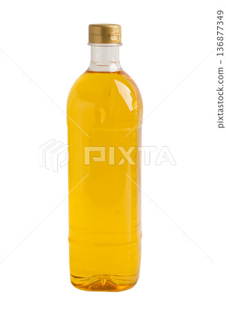 Vegetable olive oil in bottle isolated on white background with clipping path. Vegetable olive oil in bottle isolated on white background with clipping path. 136877349
