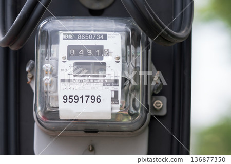 Electric measuring power meter for energy cost at home and office. Electric measuring power meter for energy cost at home and office. 136877350