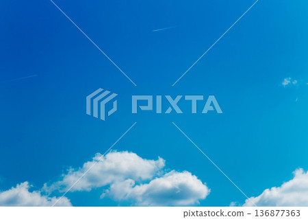 Blue sky and clouds and contrail Blue sky and clouds and contrail 136877363