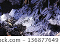 Frost pillars that resemble teeth grinding 136877649