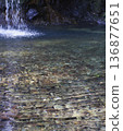 A quiet waterfall in the deep forest 136877651