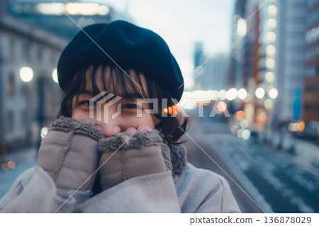 A Japanese woman in her 30s quietly closing her eyes in the city at night A Japanese woman in her 30s quietly closing her eyes in the city at night 136878029