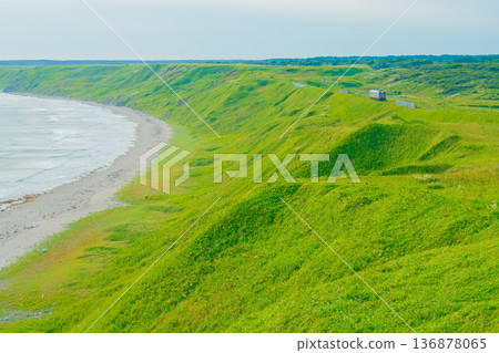 Hanasaki Line train running along Ochiishi Coast (Nemuro) in summer 136878065