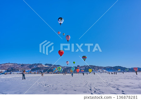 Hot air balloons dancing in the snowy fields Ojiya Balloon Rebellion Winter Spectacular Festival Hot air balloons dancing in the snowy fields Ojiya Balloon Rebellion Winter Spectacular Festival 136878281