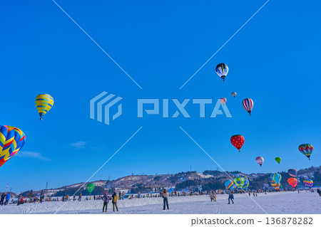 Hot air balloons dancing in the snowy fields Ojiya Balloon Rebellion Winter Spectacular Festival Hot air balloons dancing in the snowy fields Ojiya Balloon Rebellion Winter Spectacular Festival 136878282