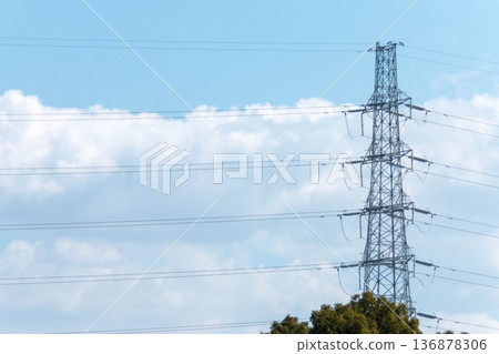 A blue sky with cumulonimbus clouds and infrastructure scenery A blue sky with cumulonimbus clouds and infrastructure scenery 136878306