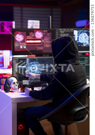 Hacker in neon apartment inserting SSD with stealth malware in PC used to evade security measures. Rogue software developer uploading storage drive with malicious code damaging firewalls Hacker in neon apartment inserting SSD with stealth malware in PC used to evade security measures. Rogue software developer uploading storage drive with malicious code damaging firewalls 136879753