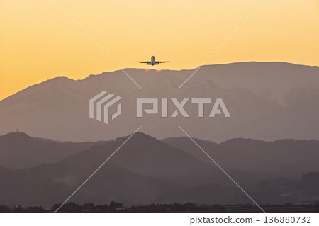 Sendai Airport at dusk: Sunset and planes taking off, Natori City, Miyagi Prefecture Sendai Airport at dusk: Sunset and planes taking off, Natori City, Miyagi Prefecture 136880732