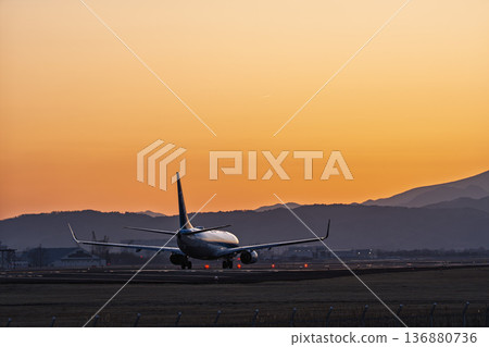 Sendai Airport at dusk: Sunset and planes taking off, Natori City, Miyagi Prefecture 136880736