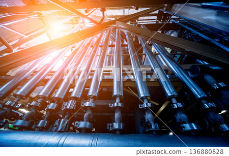 Interior of modern natural oil factory. The piping, pumps and motors Interior of modern natural oil factory. The piping, pumps and motors 136880828