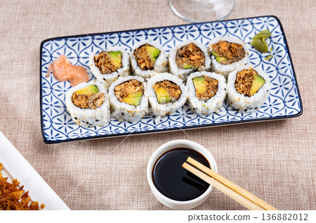 Sake Cooked Roll with baked salmon, avocado and fried onion 136882012