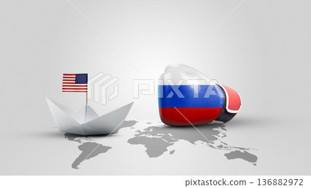 A symbolic conceptual image representing the tension between the USA and Russia, featuring a paper boat with an American flag and a Russian flag boxing glove on a world map background A symbolic conceptual image representing the tension between the USA and Russia, featuring a paper boat with an American flag and a Russian flag boxing glove on a world map background 136882972