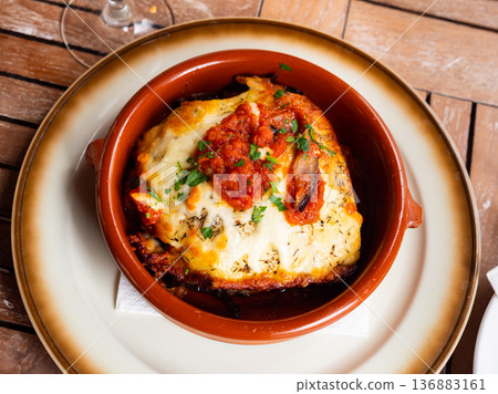 Eggplants and tomatoes with Parmesan cheese. Mediterranean cuisine 136883161