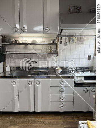Bright and clean white kitchen set Bright and clean white kitchen set 136884119