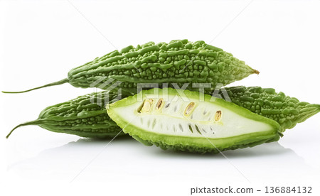 Close-up of cut bitter melon summer vegetables on white background 136884132