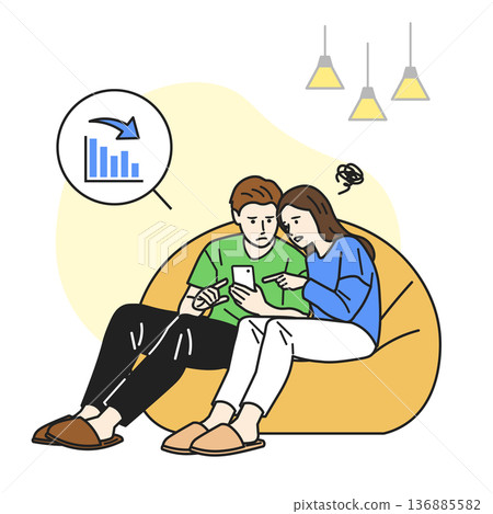 A couple losing money on their smartphones A couple losing money on their smartphones 136885582