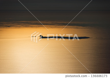 The Sea of Japan and Tobishima Island sparkling in the sunset as seen from Mt. Chokai The Sea of Japan and Tobishima Island sparkling in the sunset as seen from Mt. Chokai 136886173