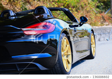 shiny black open car shiny black open car 136886602