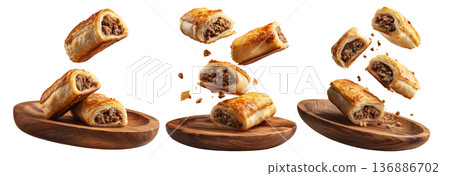 Set of Australia Sausage roll puff pastry filled with minced meat, golden flaky crust on white background, baked snack or meal Set of Australia Sausage roll puff pastry filled with minced meat, golden flaky crust on white background, baked snack or meal 136886702