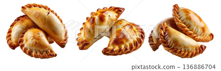 Fried baked pastry empanadas filled with ground beef cheese ham and crimped edges, isolated on white background Fried baked pastry empanadas filled with ground beef cheese ham and crimped edges, isolated on white background 136886704