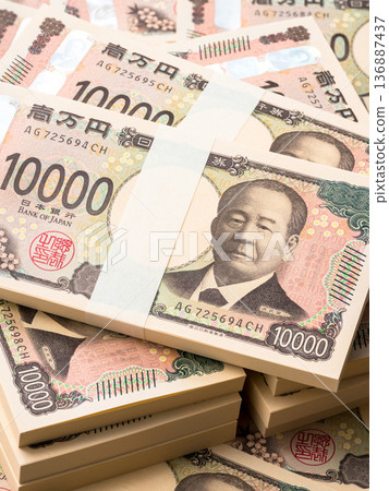 Background of stacks of 10,000 yen bills 136887437