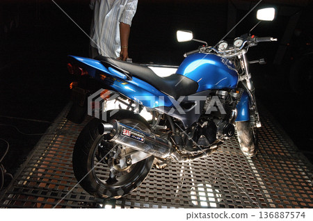 Motor Bike display in a showroom Motor Bike display in a showroom 136887574