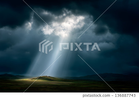 Field of grass with a bright sun shining through the clouds Field of grass with a bright sun shining through the clouds 136887743