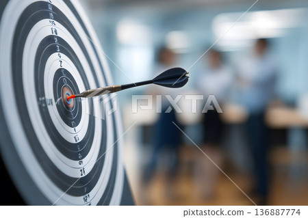Black and white target with a red arrow pointing to the center Black and white target with a red arrow pointing to the center 136887774