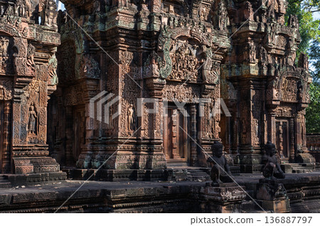 Ancient monkey guardian statues protecting entrance of banteay srei temple with intricate carvings in siem reap cambodia 136887797