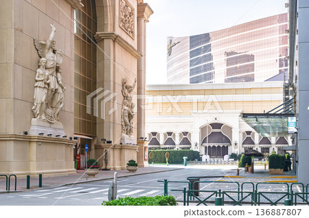 MACAU CHINA - DECEMBER 27 2025: Macau Fishermans Wharf architecture with roman style statues and building facade travel tourism landmark entertainment district luxury resort concept 136887807