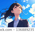 young woman looking up at the sky 136889235