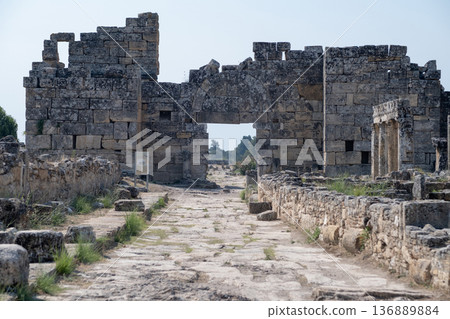 Ancient Ruins of Hierapolis Near Pamukkale Showcase Historical Architecture and Stunning Landscapes During a Bright Day 136889884