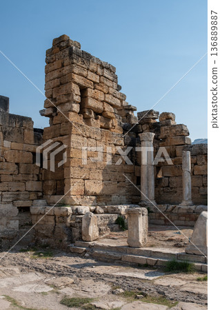Exploring the Ancient Ruins of Pamukkale With Stunning Historical Architecture and Vibrant Blue Skies Exploring the Ancient Ruins of Pamukkale With Stunning Historical Architecture and Vibrant Blue Skies 136889887