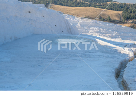Pamukkale Travertine Terraces Showcasing Natural Beauty in Turkey During Daytime With Clear Blue Water Reflecting the Sky Pamukkale Travertine Terraces Showcasing Natural Beauty in Turkey During Daytime With Clear Blue Water Reflecting the Sky 136889919