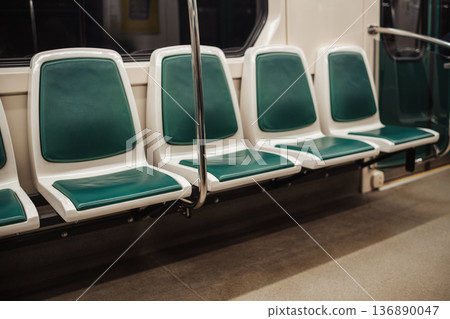Empty Subway Seats in a Modern Train During Off-Peak Hours in an Urban Area Empty Subway Seats in a Modern Train During Off-Peak Hours in an Urban Area 136890047