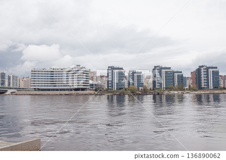 Modern Architecture Along the Neva River in St. Petersburg Showcases Urban Development in Cloudy Weather 136890062