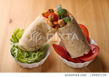 Fresh Vegetable Wraps with Broccoli and Tomato Fresh Vegetable Wraps with Broccoli and Tomato 136891216