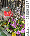 Kitano Tenmangu Shrine in Kyoto: Cow statue and gorgeous flower water fountain 136891217