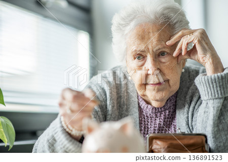 Senior woman facing financial insecurity. 136891523