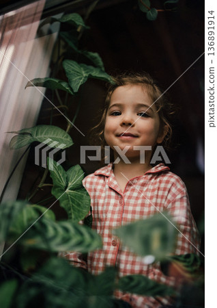 Portrait of beautiful girl in pyjamas. 136891914
