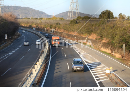 I took a photo of a car driving on the highway. I took a photo of a car driving on the highway. 136894894