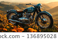 Classic Teal Motorcycle Parked in a Field of Yellow Flowers at S 136895028