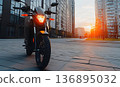 Stylish Black Motorcycle in Front of Modern City Buildings at Su 136895032