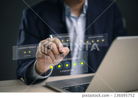 Man hand writing 5 star review customer feedback hologram. Online survey satisfaction evaluation. Best service quality positive. Businessman technology digital interface laptop work dark background. Man hand writing 5 star review customer feedback hologram. Online survey satisfaction evaluation. Best service quality positive. Businessman technology digital interface laptop work dark background. 136895752