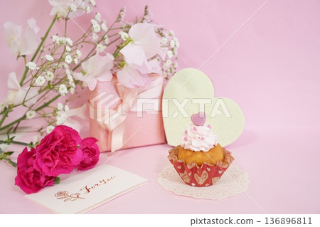 Cute handmade cupcakes with heart-shaped chocolate and cake Cute handmade cupcakes with heart-shaped chocolate and cake 136896811
