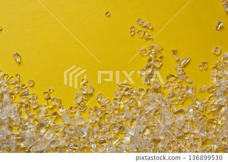 crystal on yellow background crystal on yellow background 136899530