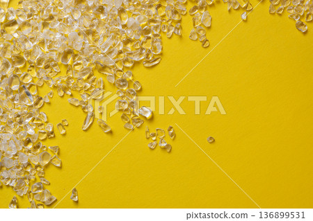 crystal on yellow background crystal on yellow background 136899531