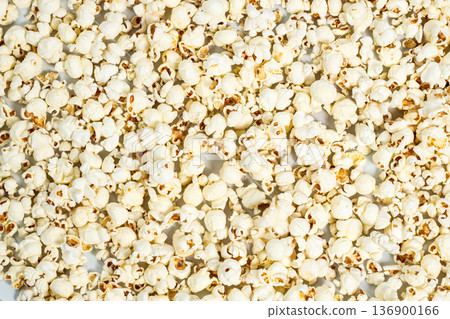 Popcorn as a background image. Advertising concept Popcorn as a background image. Advertising concept 136900166