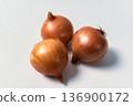 Onion heads isolated on a white background. Vegetables for cooking 136900172