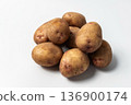 Raw potatoes isolated on a white background. A popular vegetable. An essential product for cooking 136900174